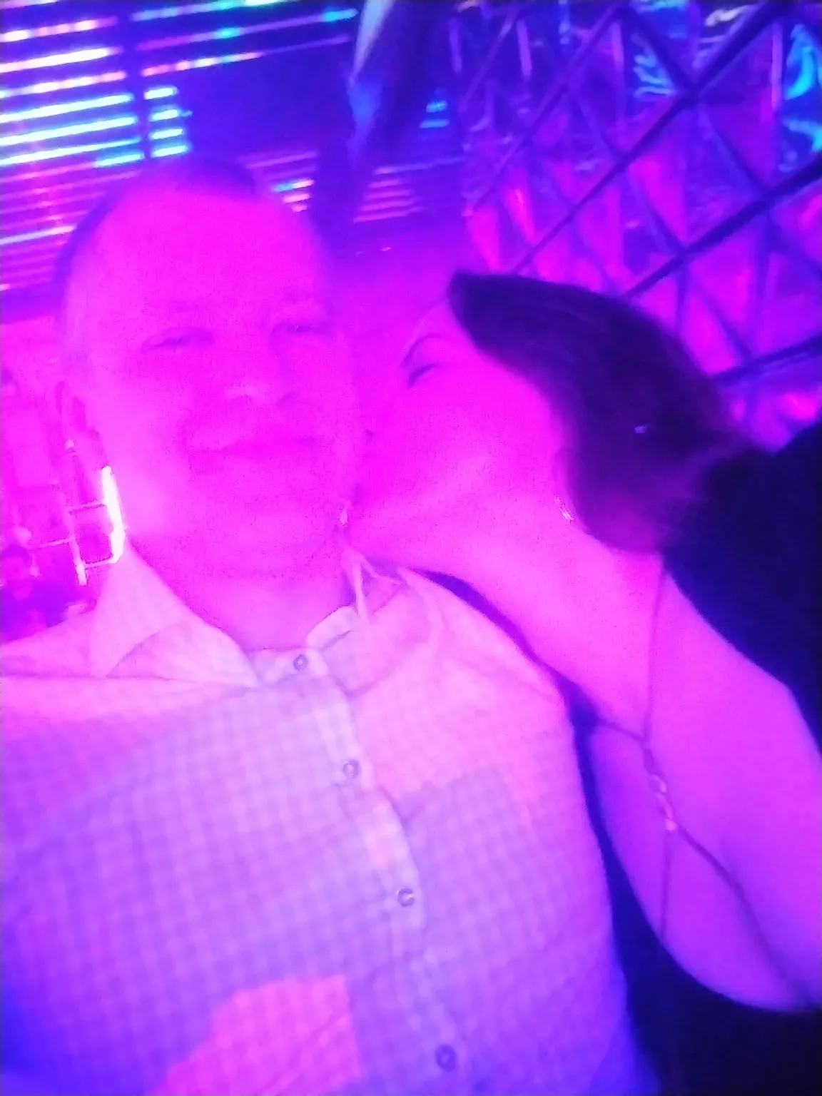 Couple enjoying a date night out at a Latin night in Calgary